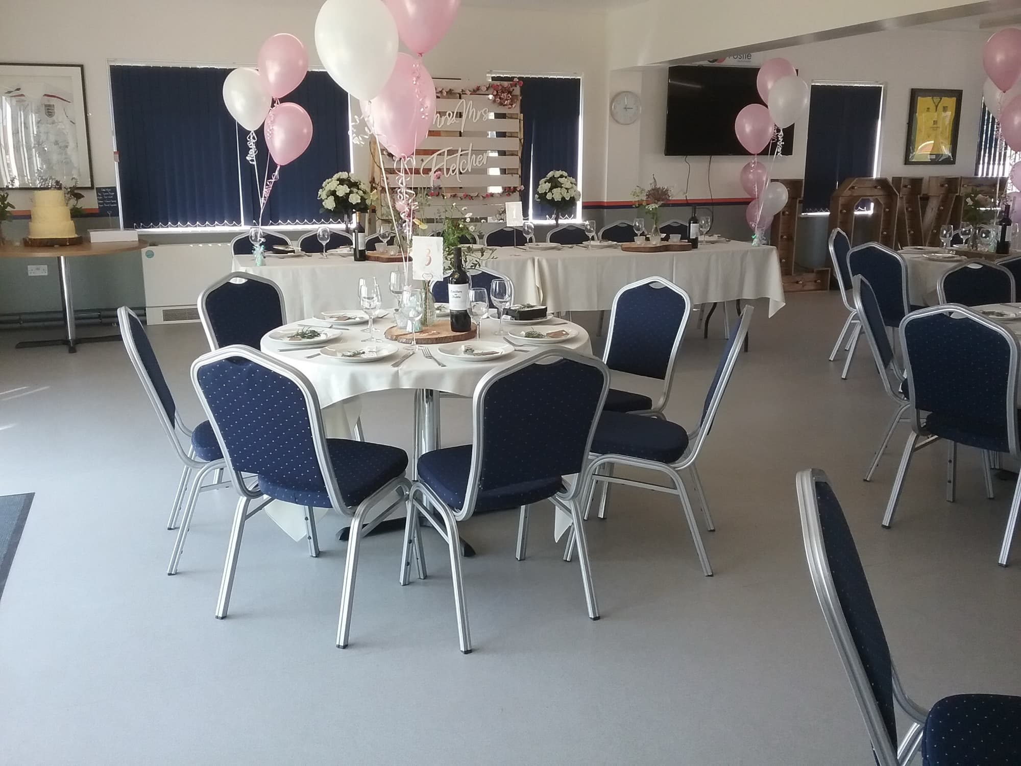 Top table set for a wedding reception in the community room